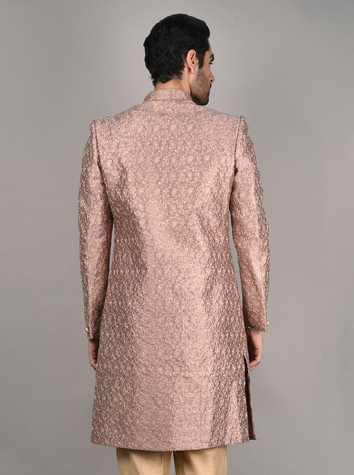 Step out in style with this Onion Pink Indo Western, featuring a Mid Length Jacket and intricate kasab taar work, ideal for special occasions in the USA.