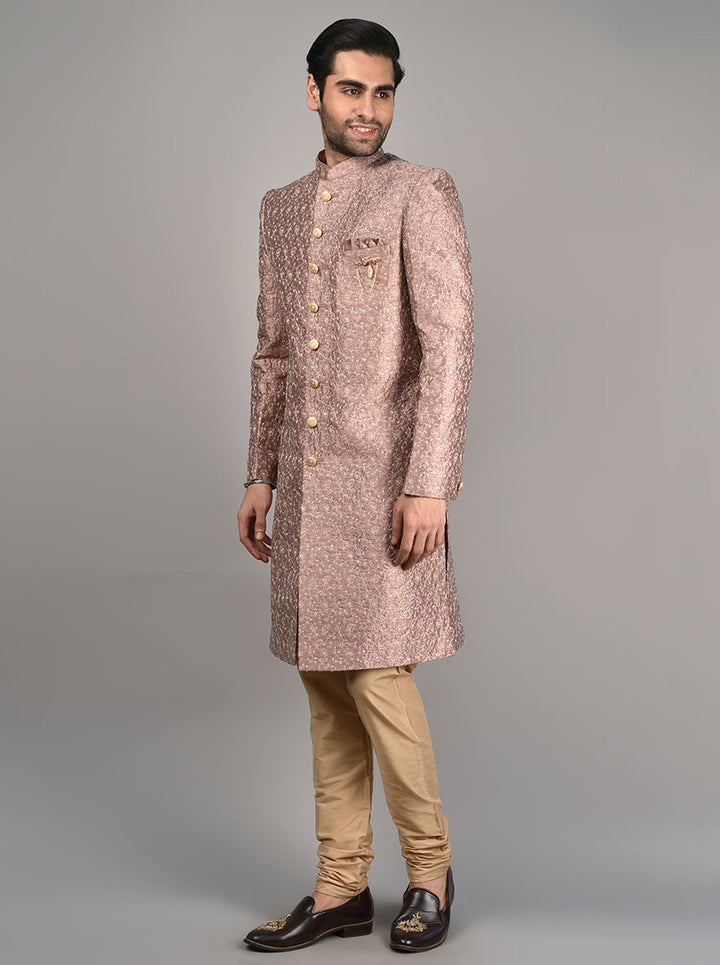 This stylish Onion Pink Indo Western set, complete with a Mid Length Jacket and elegant kasab taar work, is perfect for elevating your men's fashion in the USA.