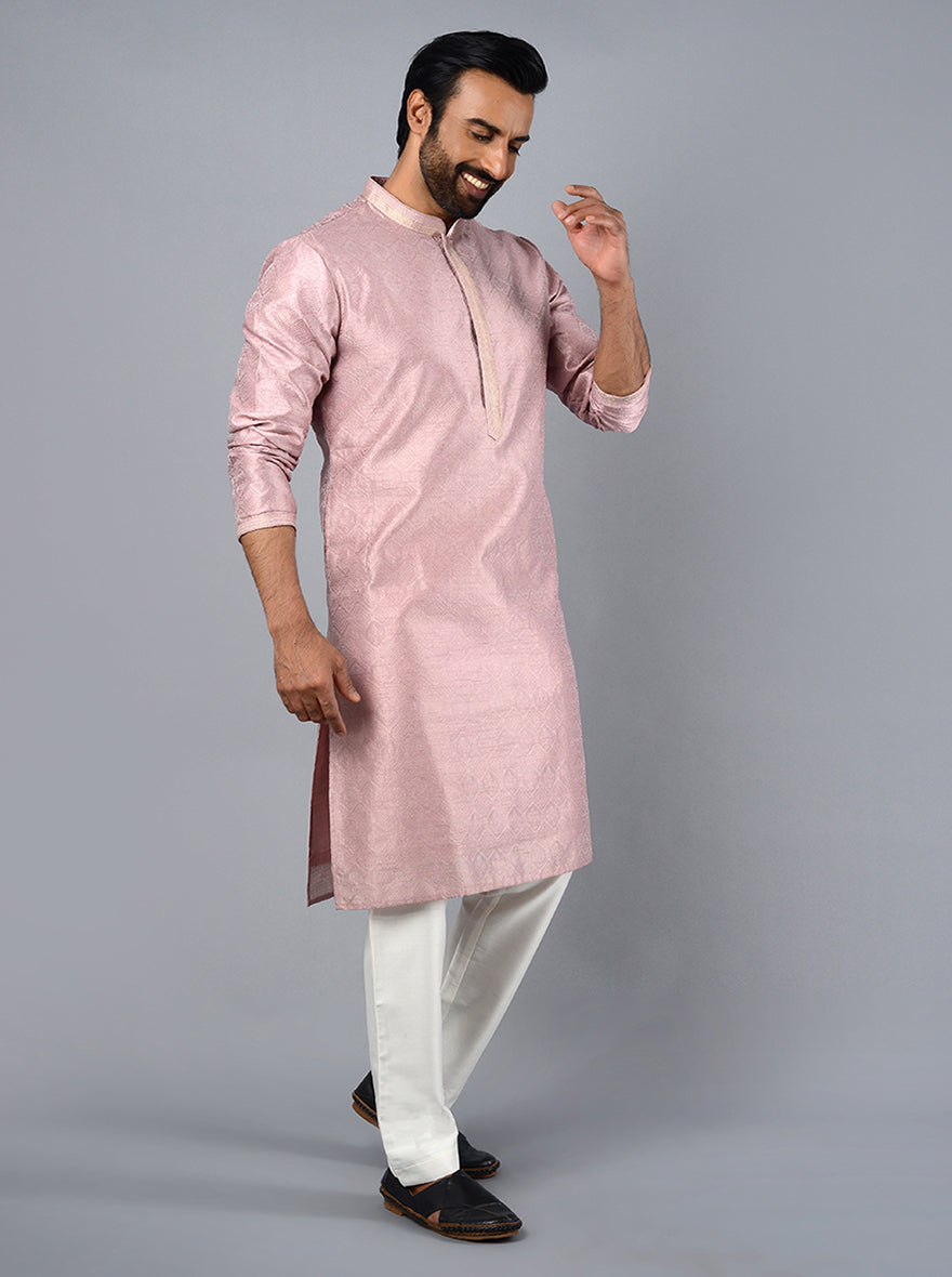 Chic onion pink kurta set with intricate thread work, ideal for festive gatherings and celebrations in the USA.