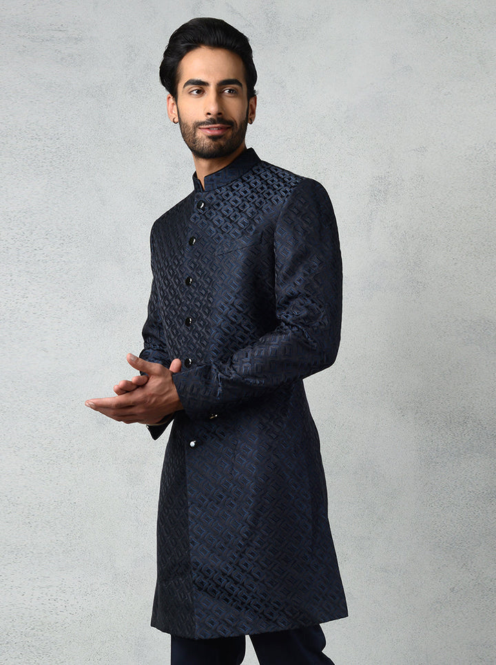 Modern teal black Indo-Western kurta with black metal buttons and structured cut for a classic ethnic look.