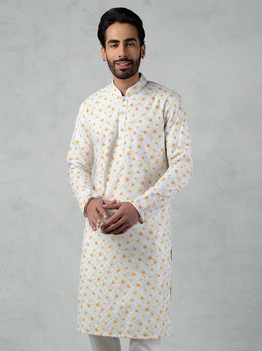 Stylish linen kurta pajama in white and ochre yellow, designed for festive occasions and traditional celebrations in the USA.