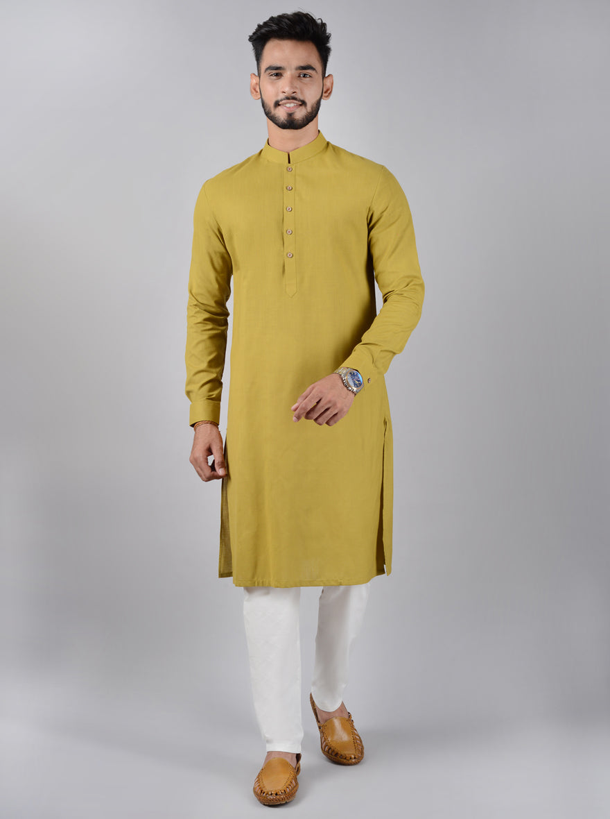 Featuring a mandarin collar and full sleeves, it pairs beautifully with churidars.