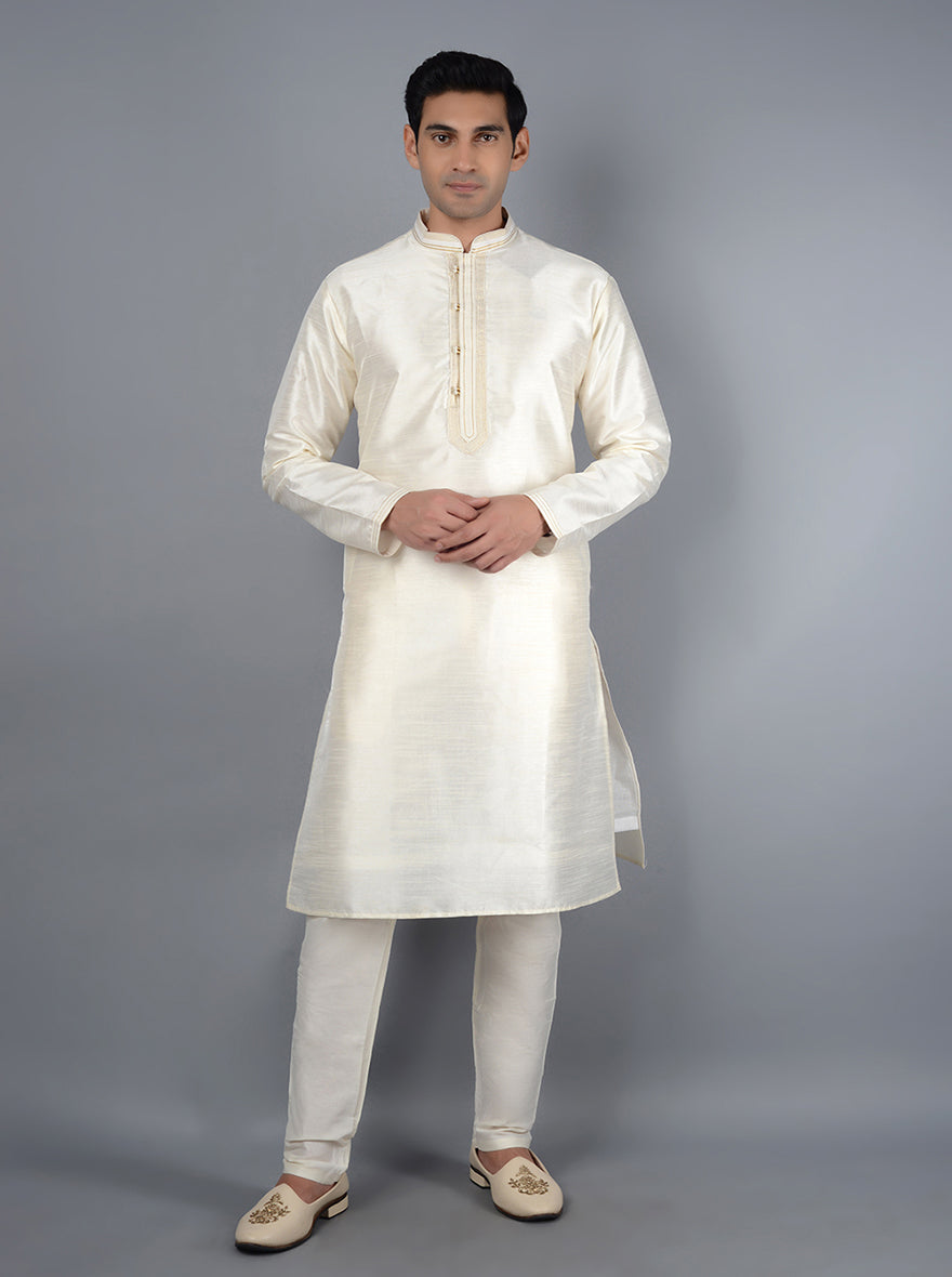 Experience style and comfort with this sophisticated Embroidered Cream Kurta Set.