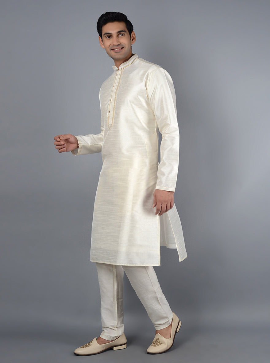 Make a statement at gatherings with this fashionable Embroidered Cream Kurta Set.