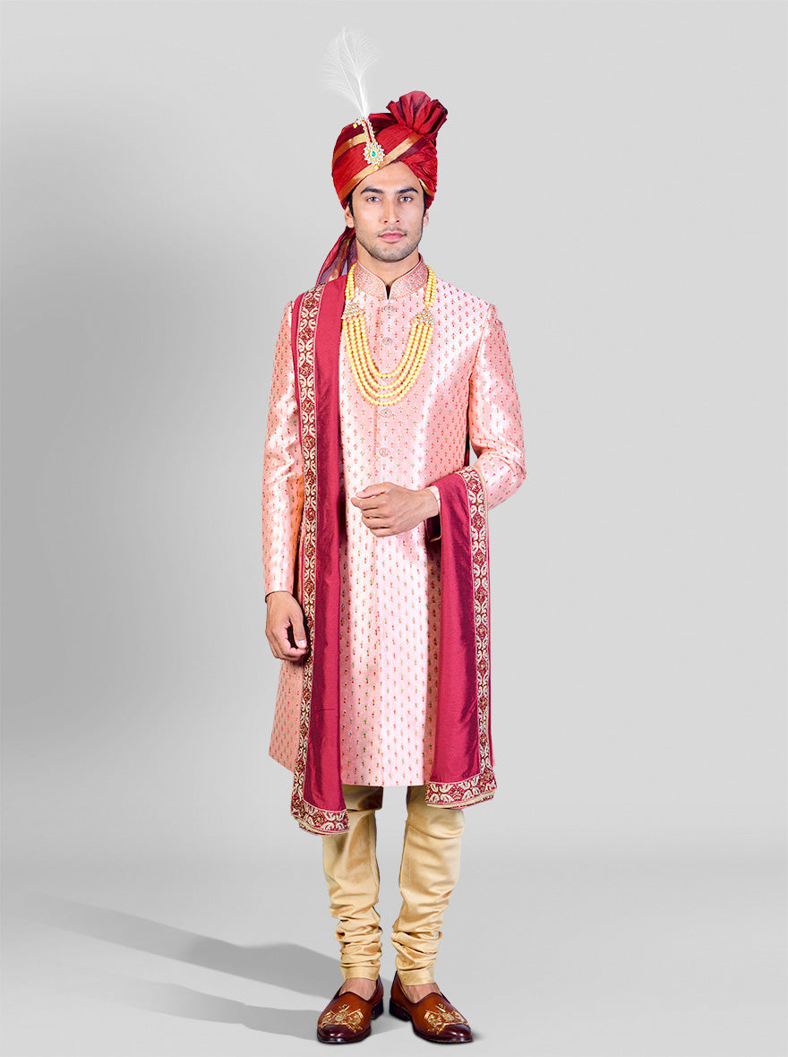 Elegant light pink sherwani with a mandarin collar, crafted from luxurious silk blend fabric.