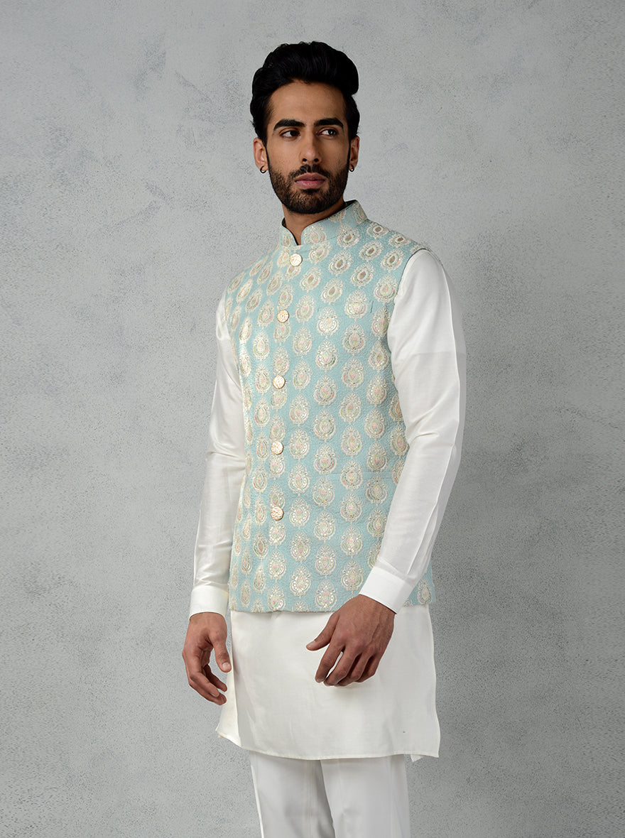 Aqua green bandhgala jacket featuring floral embroidery and golden buttons, perfect for formal occasions.