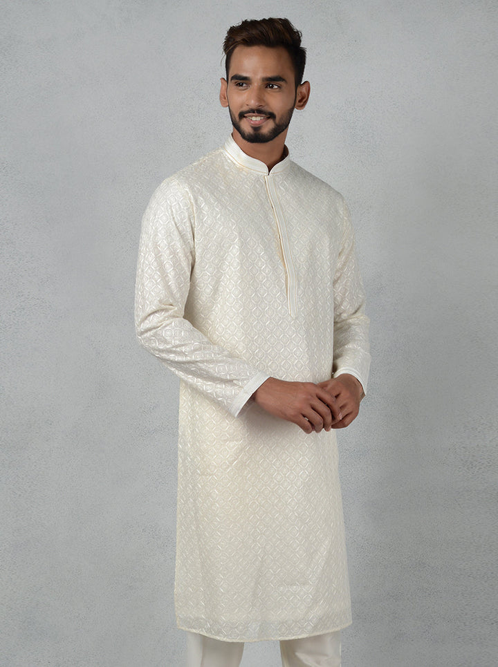 Comfortable off-white kurta for celebrations.