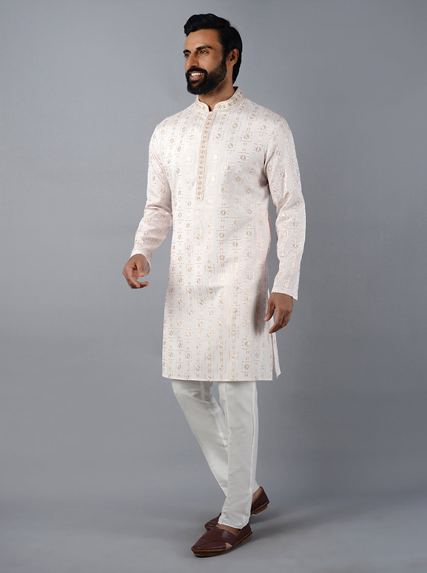 Elegant pink kurta set made from silk blend, featuring beautiful embroidery for a traditional look at celebrations in the USA.