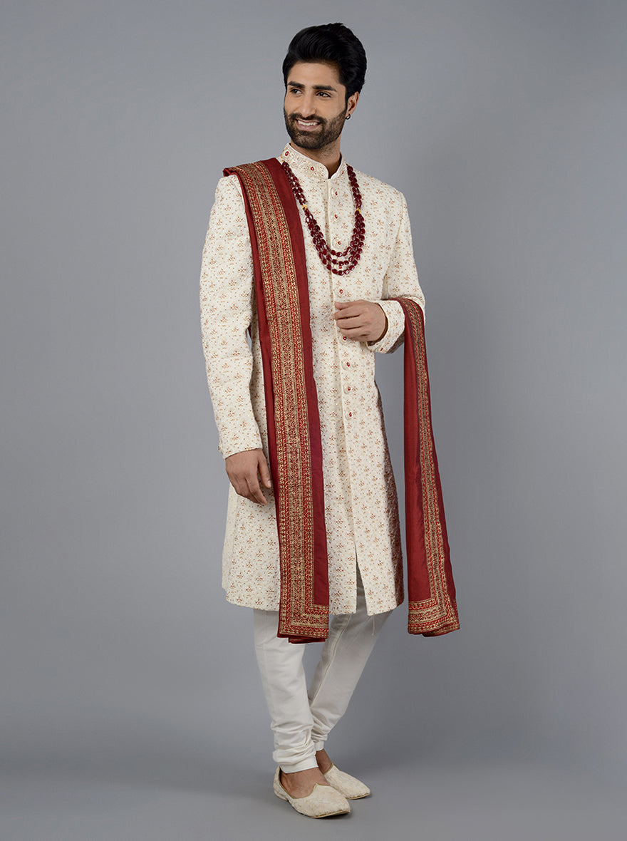 Perfect for Indian weddings, this sherwani features luxurious silk blend fabric and detailed embroidery.