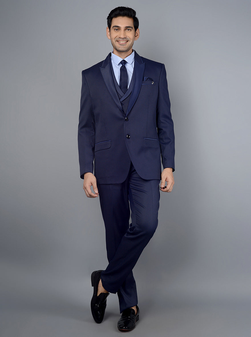 Stylish men's navy-blue suit made from premium fabric, ideal for weddings and formal gatherings.