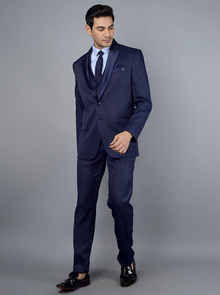 Sophisticated navy-blue solid suit offering a perfect tailored fit for a confident and elegant look.