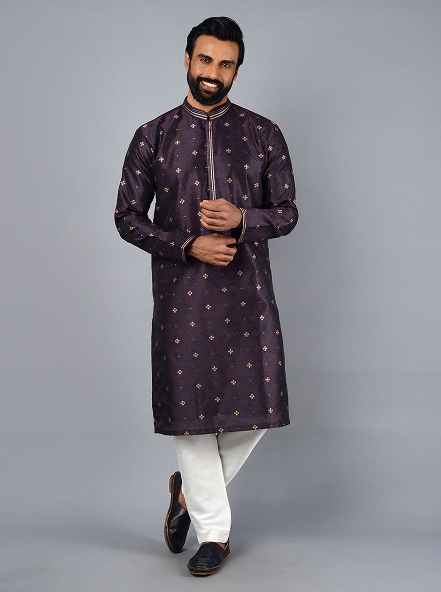 Sophisticated purple kurta set featuring intricate thread work, perfect for traditional looks at wedding receptions in the USA.