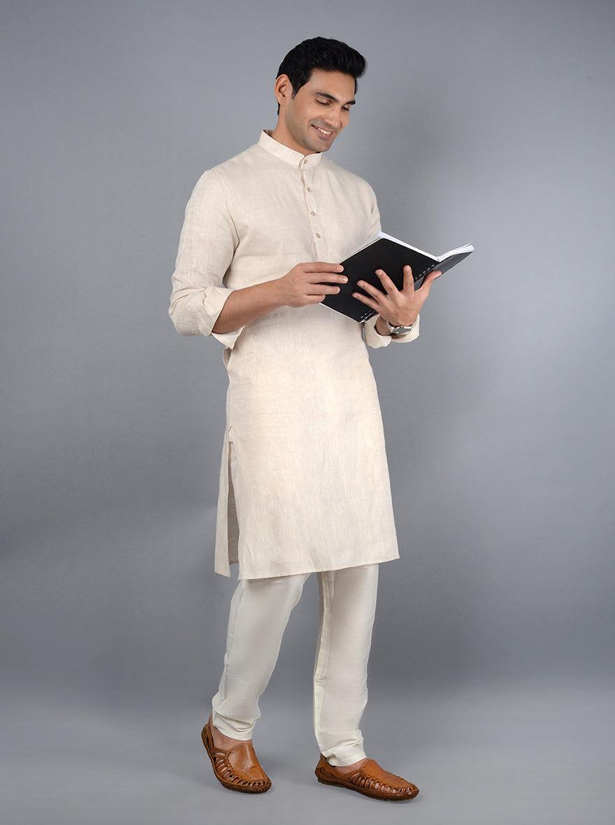 Embrace tradition with a contemporary twist in our elegant beige kurta set.