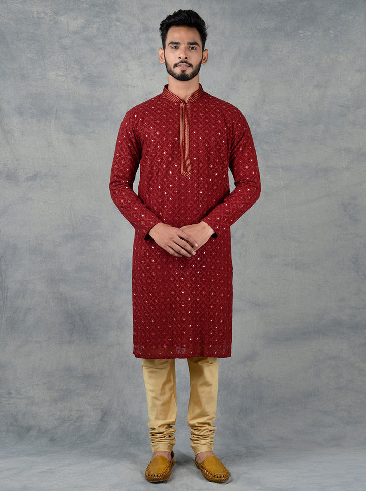 USA men’s maroon Lucknowi kurta set, stylish wedding attire.