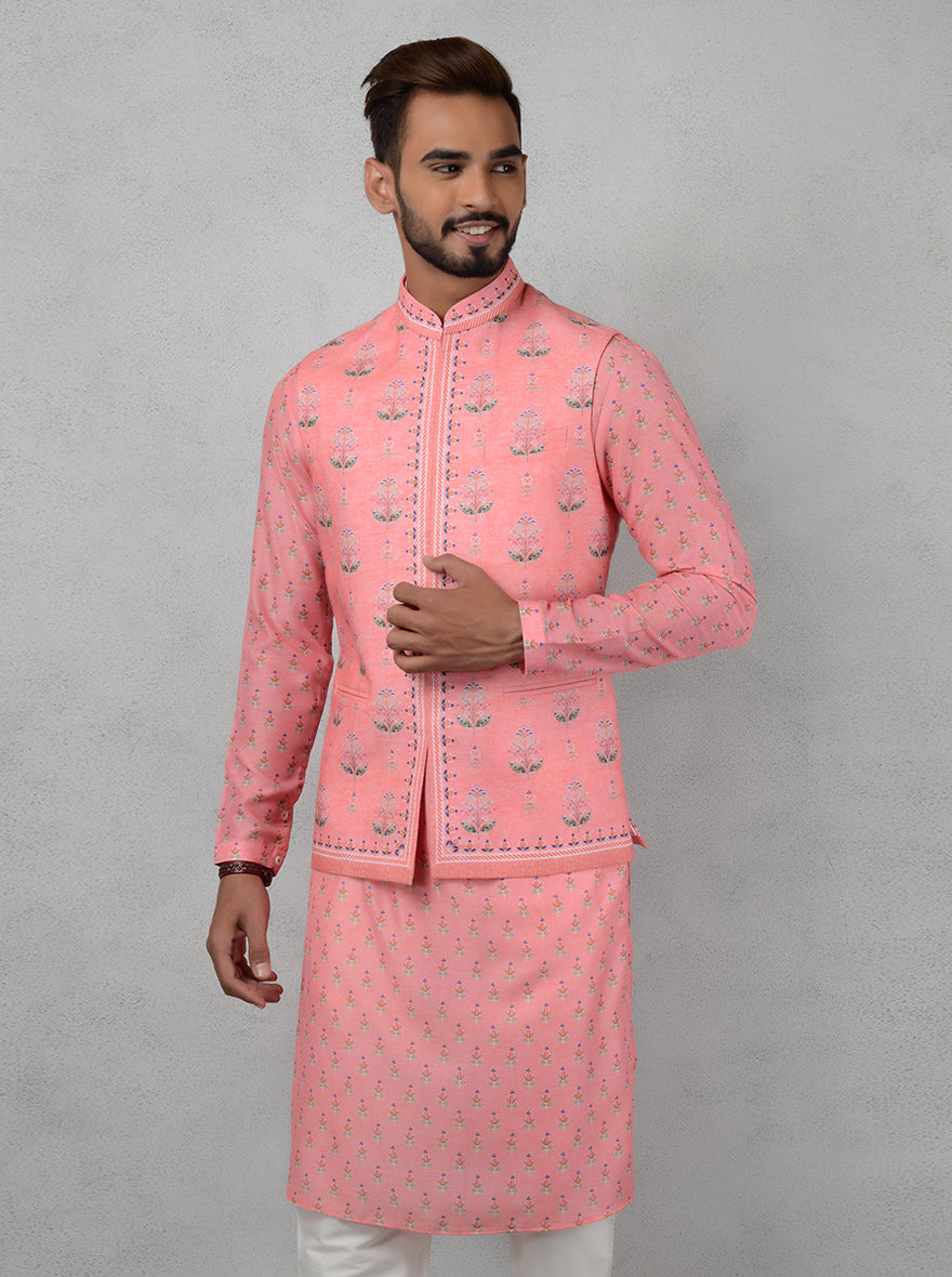 Floral prints on pink kurta make it a chic choice.