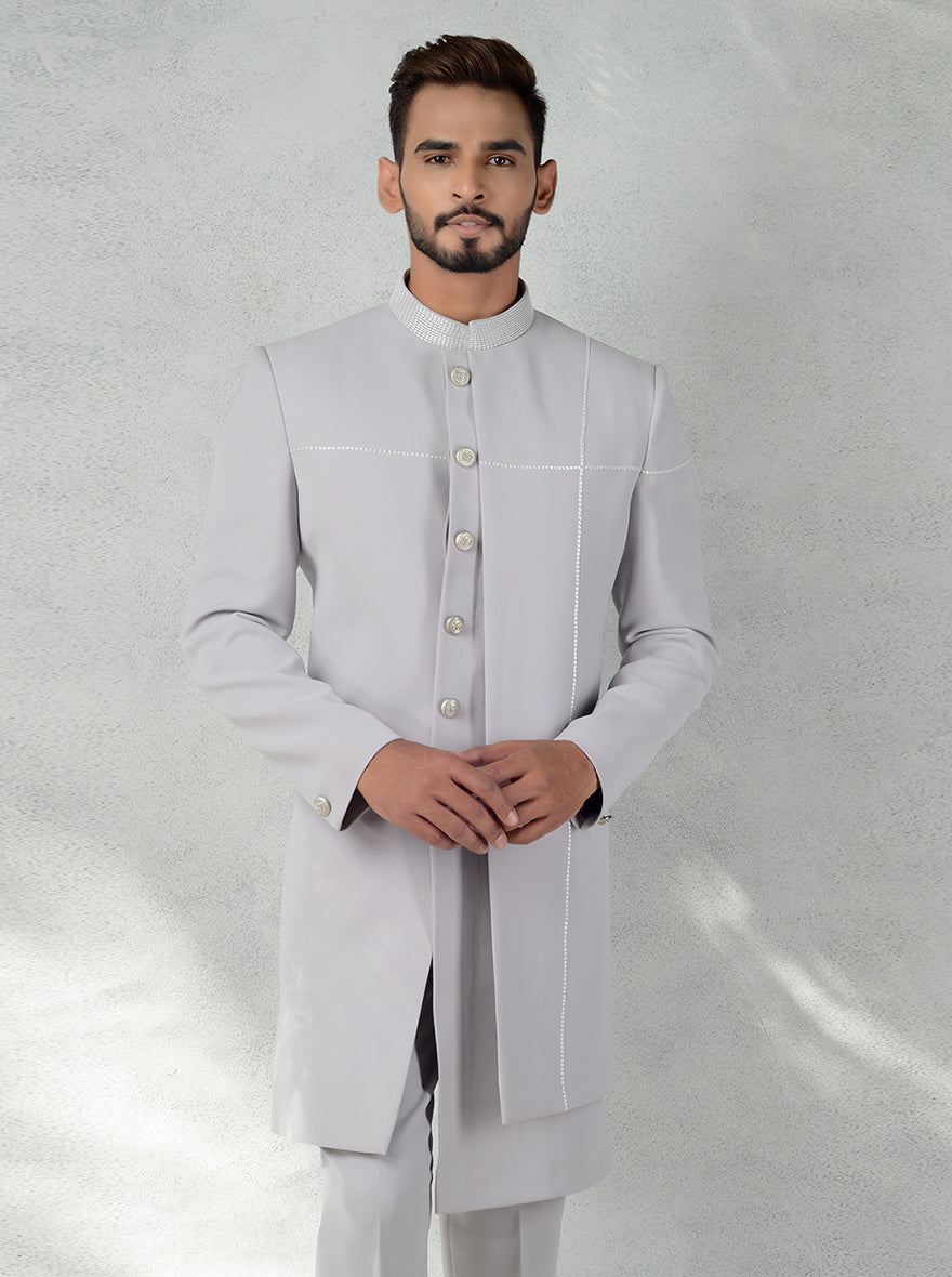 Men’s grey Indo-Western outfit with cutdana embroidery and matching pants for a modern ethnic look.