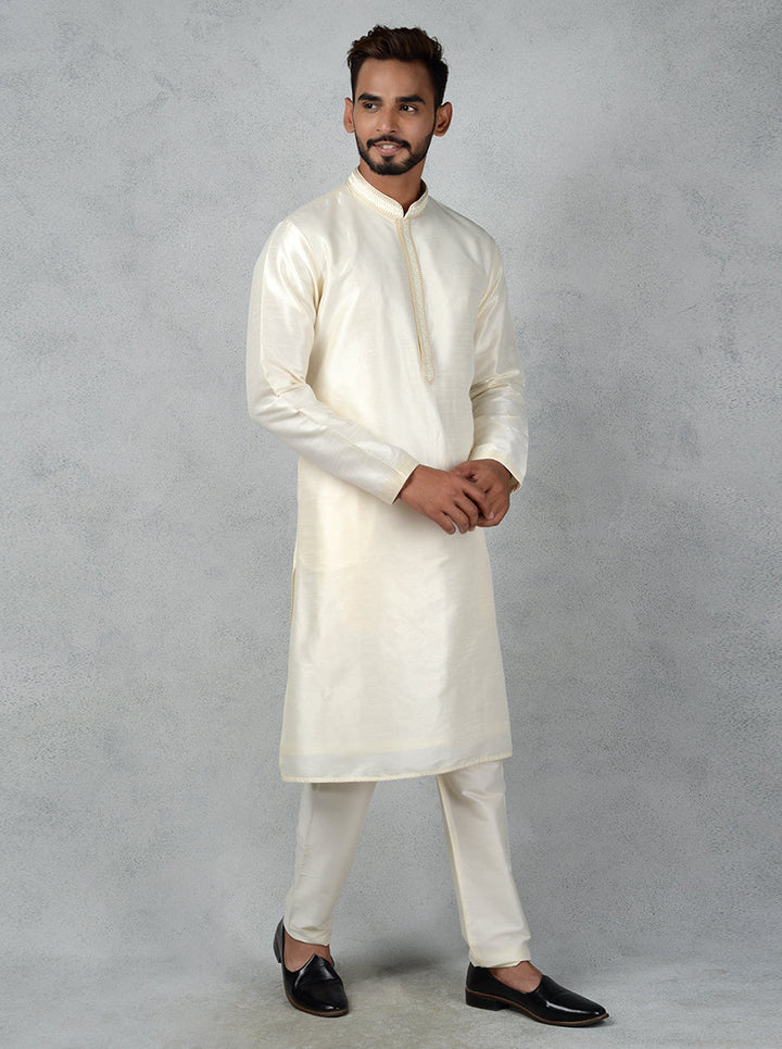 Eye-catching cream kurta set for cultural celebrations.